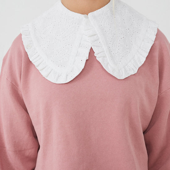 Sudadera con CUELLO independiente NOY (not only yoga) modelo CÉCILE de algodón orgánico blanco atado con botón en la parte delantera